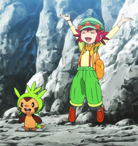 a girl with her arms outstretched is standing next to a small monkey
