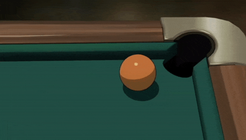 a pool ball on a pool table with a green cloth