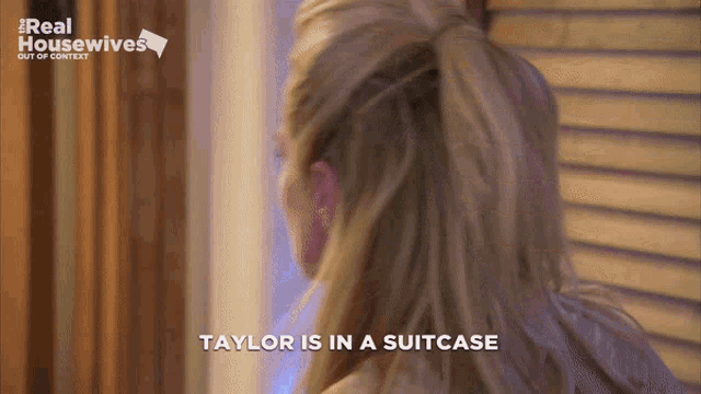 a woman says taylor is in a suitcase in front of a real housewives logo