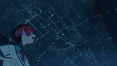 a red robot with a purple light on its head stands in a dark room