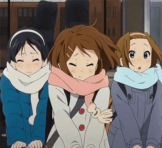 three anime girls are standing next to each other and one has a scarf around her neck