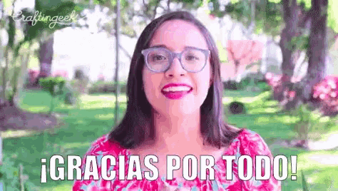 a woman wearing glasses and a pink top says gracias por todo