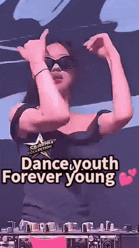 a woman is dancing with the words dance youth forever young