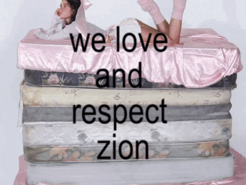 a stack of mattresses with the words " we love and respect zion "