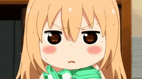 a close up of a cartoon girl making a funny face with her eyes closed .