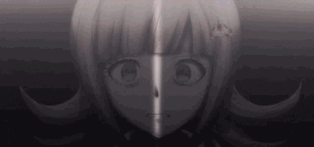 a close up of a girl 's face with a light coming out of her eye