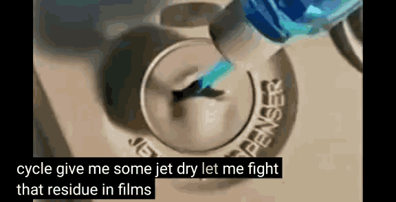 a bottle of liquid is being poured into a keyhole with the words cycle give me some jet dry let me fight that residue