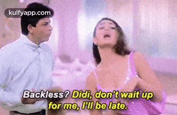 a man and a woman are standing next to each other . the woman is crying and the man is laughing .