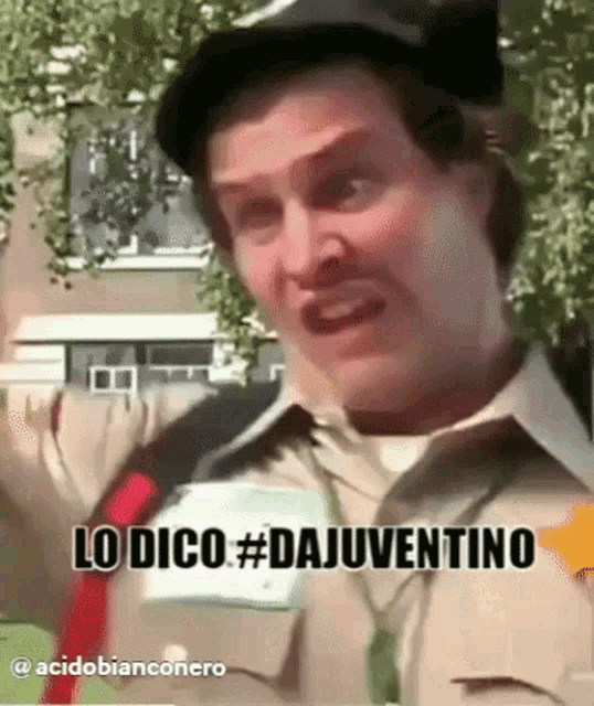 a man wearing a hat and tie says lo dico # dajuventino