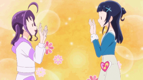 two anime girls standing next to each other with flowers behind them