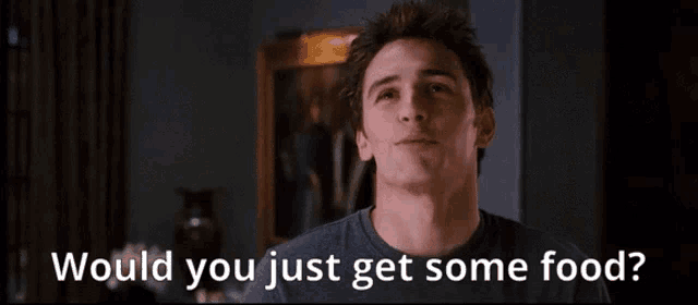 a man says " would you just get some food " in front of a cat