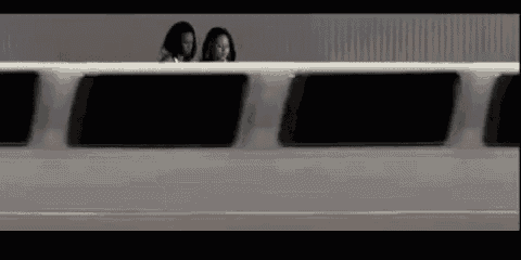 two women are standing in a white limousine
