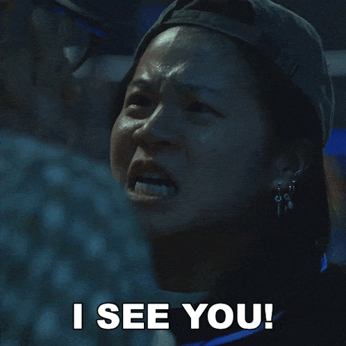 a woman says i see you in front of a man