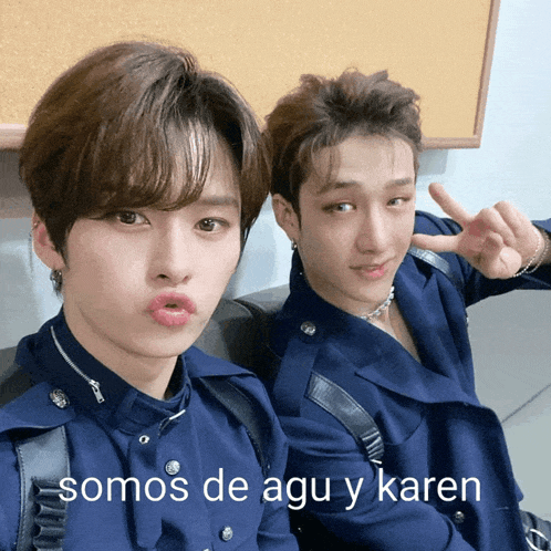 two young men are posing for a picture and one of them says somos de agu y karen
