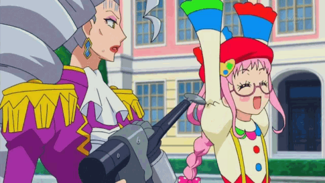 a girl in a pink hat is holding a gun next to a woman in a purple coat