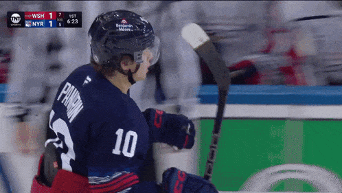 a hockey player with the number 10 on the back of his shirt