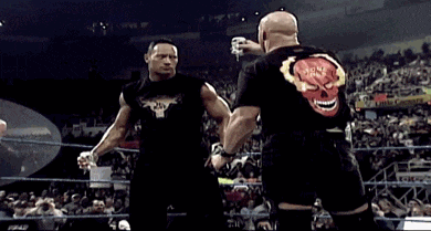 a man in a black shirt with a red skull on it