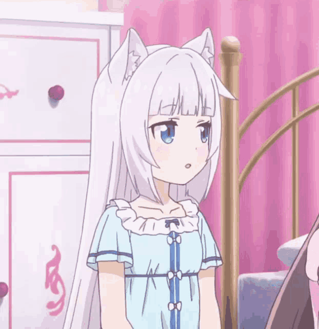 a girl with white hair and cat ears standing in front of a bed
