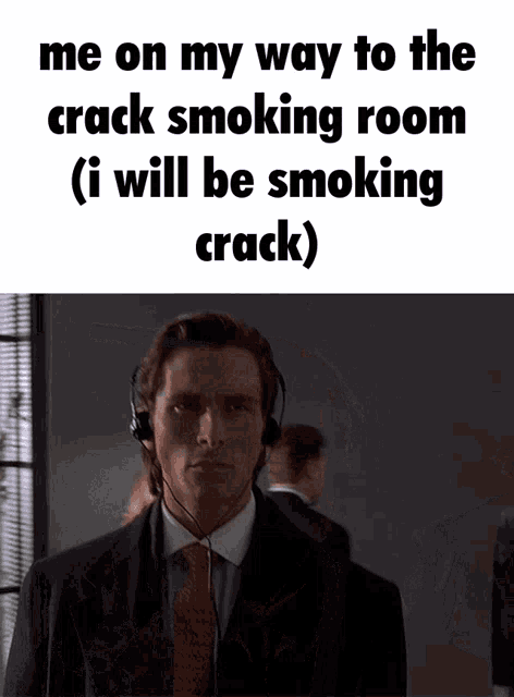 a man in a suit and tie with headphones says me on my way to the crack smoking room ( i will be smoking crack