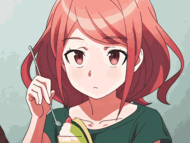 a girl with red hair is holding a spoon and a bowl of food