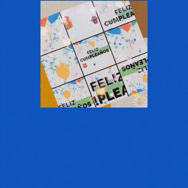 a blue background with a birthday card that says feliz cumpleanos on it