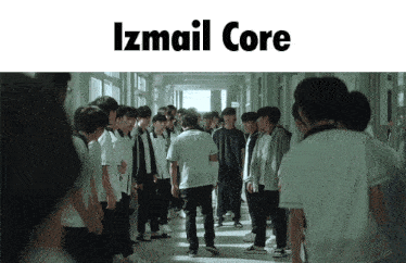 a group of people are walking down a hallway and the words izmail core are above them