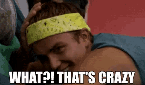 a man wearing a headband with the words what that 's crazy written on it