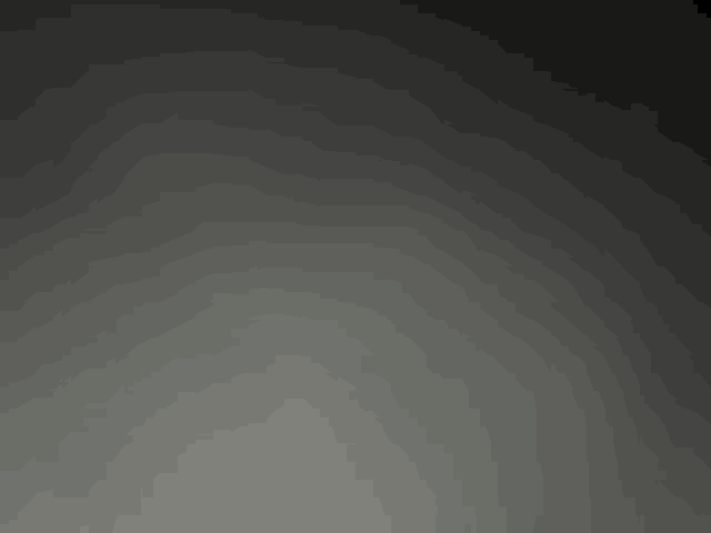 a close up of a gray background with a gradient