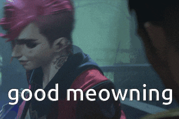 a picture of a woman with pink hair and the words good meowning on the bottom