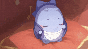 a cartoon character is sitting on a red pillow with his eyes closed