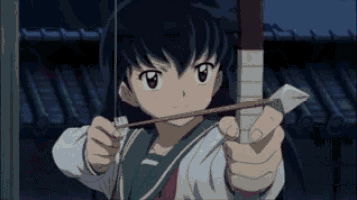 a girl is holding a bow and arrow