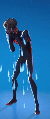 a man in a wet suit is standing with his hands on his face