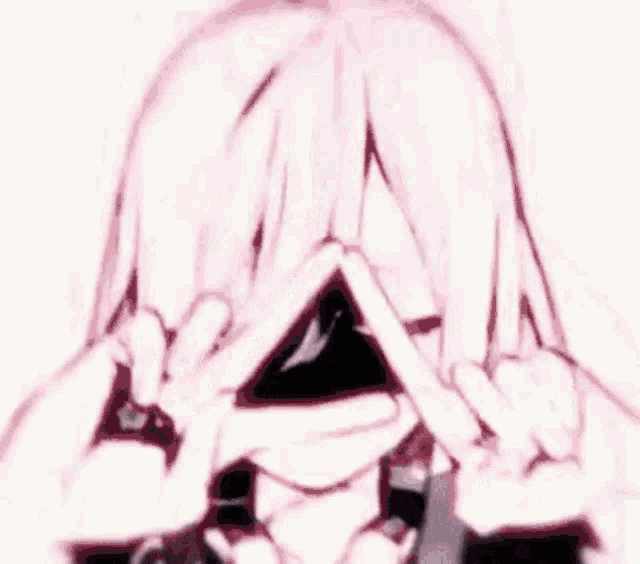 a close up of a pink triangle in the dark .