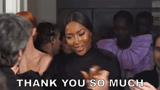 a woman says thank you so much to a man in a crowd
