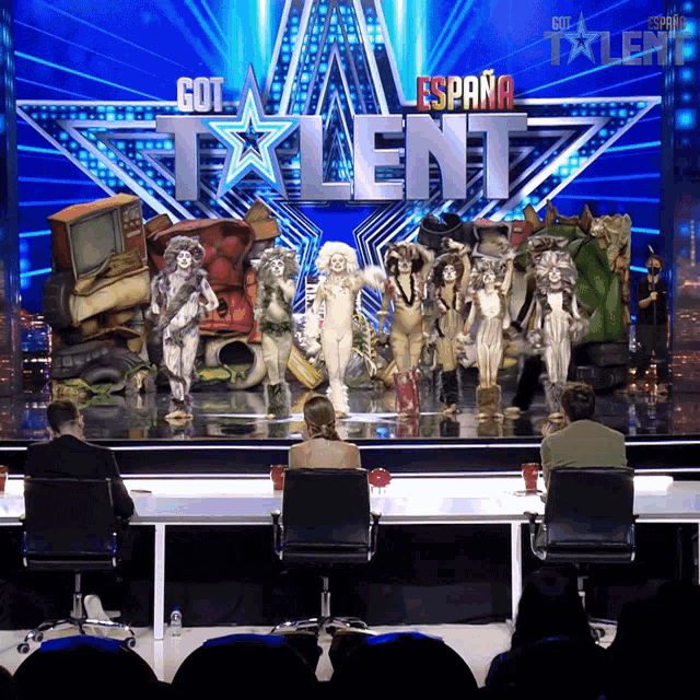 a group of people on a stage in front of a sign that says " got talent "