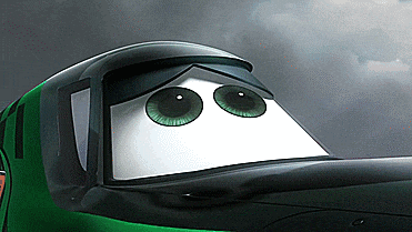 a close up of a car with green eyes and a visor