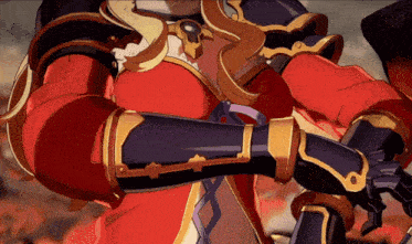 a close up of a person 's arm in a red and gold armor