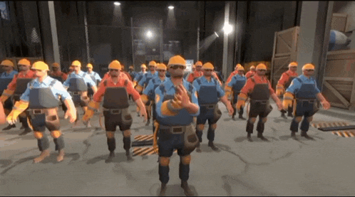 a group of construction workers are standing in a line