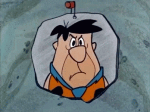 a cartoon drawing of flintstone with an angry face