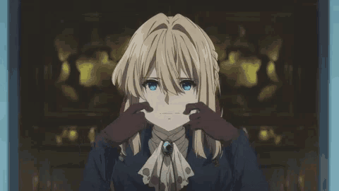 a girl with blonde hair and blue eyes is standing in a doorway .