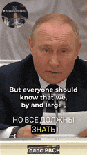 a man in a suit and tie is giving a speech in russian