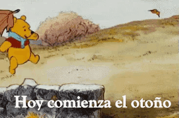a cartoon of winnie the pooh with the words hoy comienza el otoño