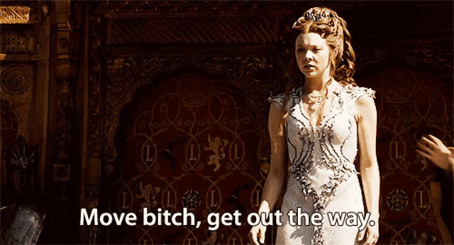 a woman in a white dress is standing in front of a wall and says move bitch get out the way .