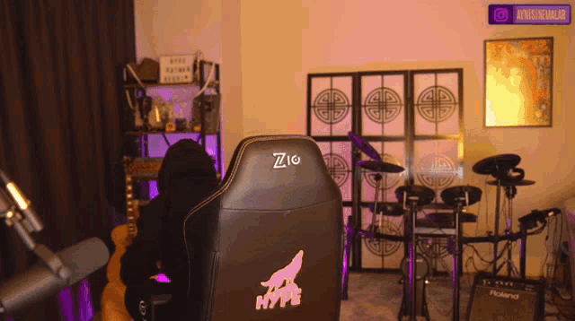 a person sitting in a chair that says hype