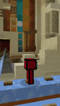 a red and black block is sitting on a table in a video game