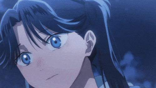 a close up of a girl with blue hair and blue eyes