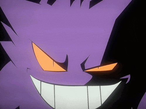 a close up of a purple cartoon character with orange eyes