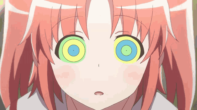 a close up of a girl 's face with a hypnotic look on her face