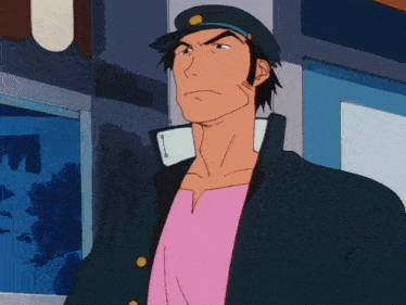 a man wearing a hat and a pink shirt stands in front of a window