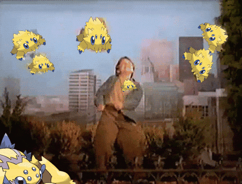a man stands in front of a bunch of yellow cartoon characters